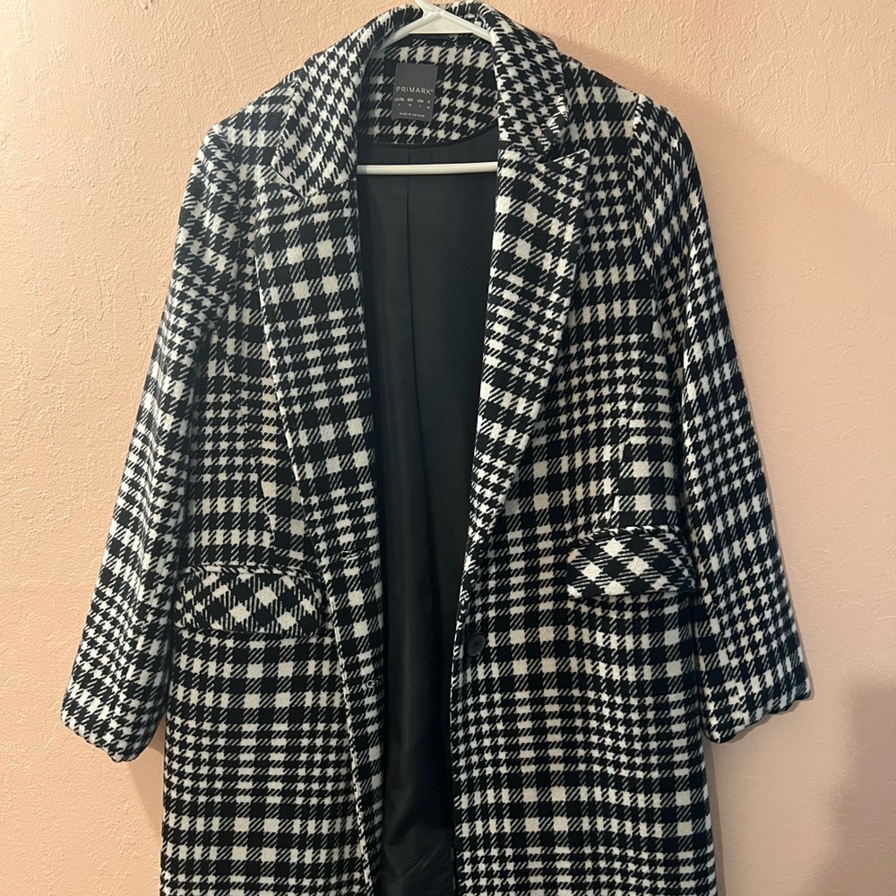 Knee length black and white coat
